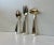 A set of 25 pieces (12+12+1) spoons, cake forks and a single cream spoon. This design/patterns is called Elite and was...