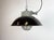 Industrial hanging lamp manufactured by Elektrosvit in former Czechoslovakia during the 1960s. It features a black enamel...