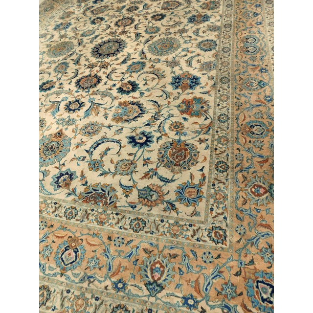 Distressed and damaged vintage Persian rug. Floral pattern on ivory field. Rug is damaged, in very bad condition and needs...