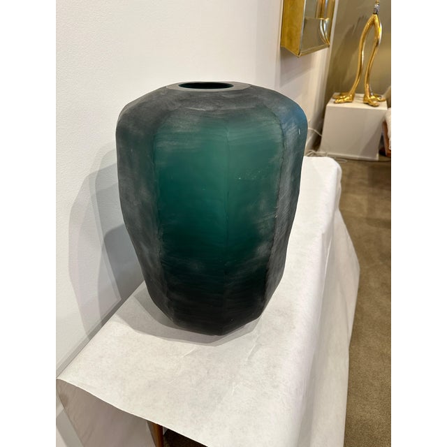 This is a super-cool deep green faceted Murano glass oversized vase with lovely details throughout. The intentional rough...