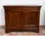 Antique Provençal sideboard with a hooded top, crafted from solid walnut, dating from the Louis-Philippe period in the...