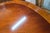 Wood English Regency Revival Flame Mahogany Oval Extension Dining Table With Satinwood Crossbanding and Brass Paw Feet, Circa 1935 For Sale - Image 7 of 9