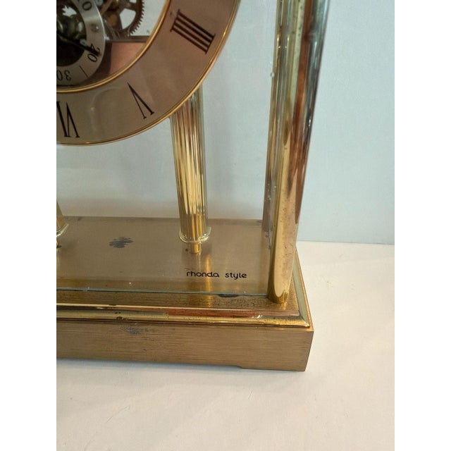 Vintage Rhonda Style Brass Skeleton Movement Mantel Clock. This elegant timepiece features a visible mechanical skeleton...