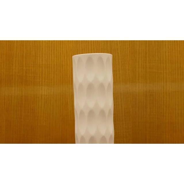 White porcelain vase with matt glaze, designed by heinrich fuchs for lorenz hutschenreuther in germany, 1960s. printed:...