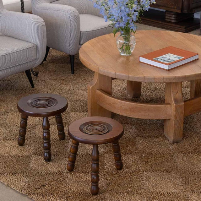 Lovely vintage stool with circular seat and bobbin tripod legs from France. Circular seat has beautiful carved ring detail...