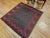 This exceptionally rare early 20th-century Persian Baluch Tribal Sofreh Kilim is a highly collectible piece of authentic...