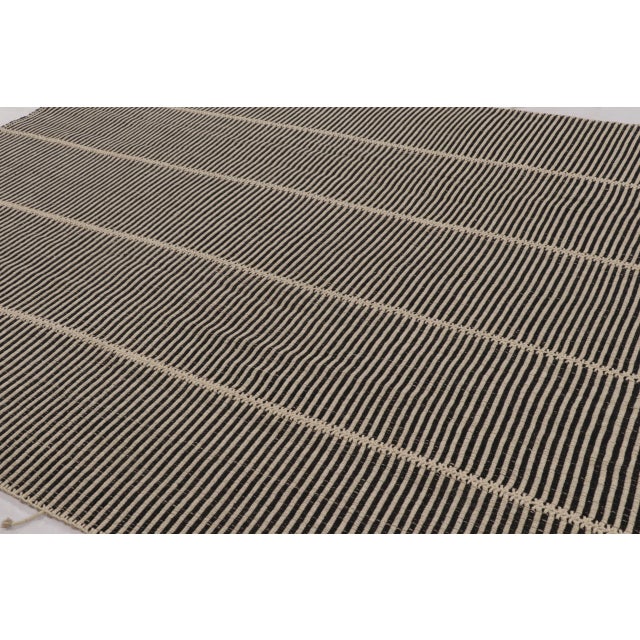 Handwoven in wool, this 9x12 contemporary Kilim is from an exciting new custom-capable flatweave collection by Rug &...