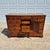 This is a handsome vintage early American or colonial revival style cherry dresser that was made in the United States by...