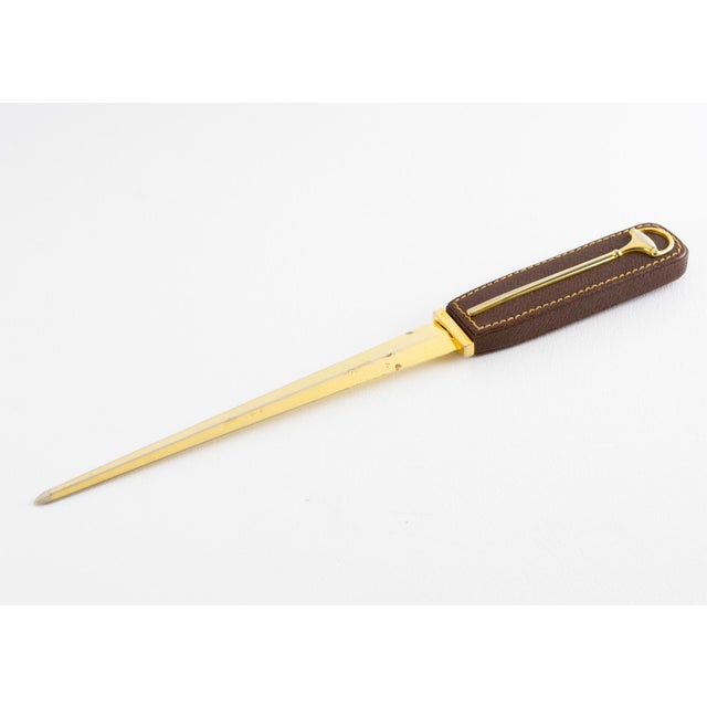 Bring a touch of sophistication to your private workspace with this rare Gucci-designed luxury leather desktop accessory....