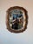 Elegant 1960’s Italian Hollywood Regency wall mirror featuring a beautifully carved sculptural wood frame with a richly...