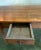 This French table / writing desk has two drawers for ample storage. It is substantial, has a rich patina and is finished...