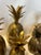 This is a beautiful set of brass pineapple catchall boxes. They open up with a lid at the top of the pineapple and have...