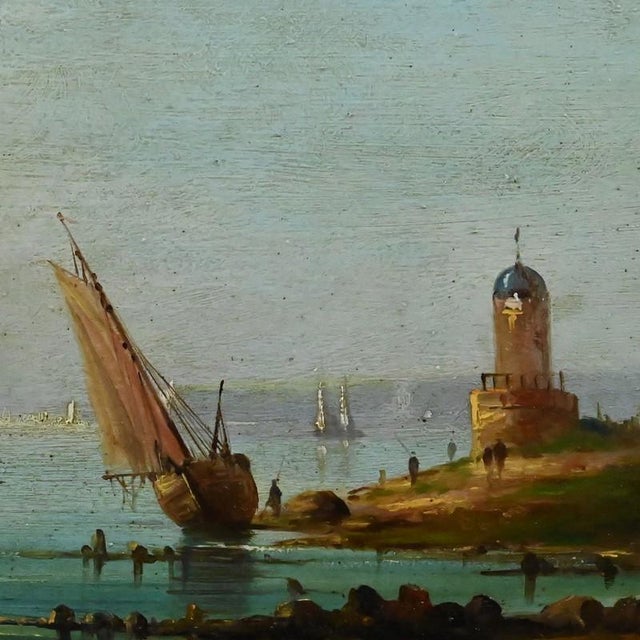 Elegant and mysterious, this 19th-century seascape captures a moment of life on the shore: sailboats gliding on a calm...