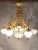 Presenting a breathtaking, handmade chandelier crafted in the elegant French Louis XVI style. This exquisite piece is made...