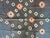 Striking "pelangi" tie-dyed textile from Toraja Land, South Sulawesi. We added a linen border, double backed on both ends....