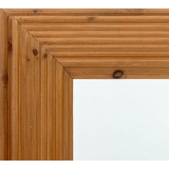 Contemporary Molded Pine Wood Framed Beveled Glass Mirror. Mirror plate: 17.5" H x 21.5" W; frame: 31" H x 35" W x 2" D....