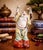 A delightful vintage Chinese ceramic sculpture depicting the Laughing Buddha (Budai), standing with raised arms and a...