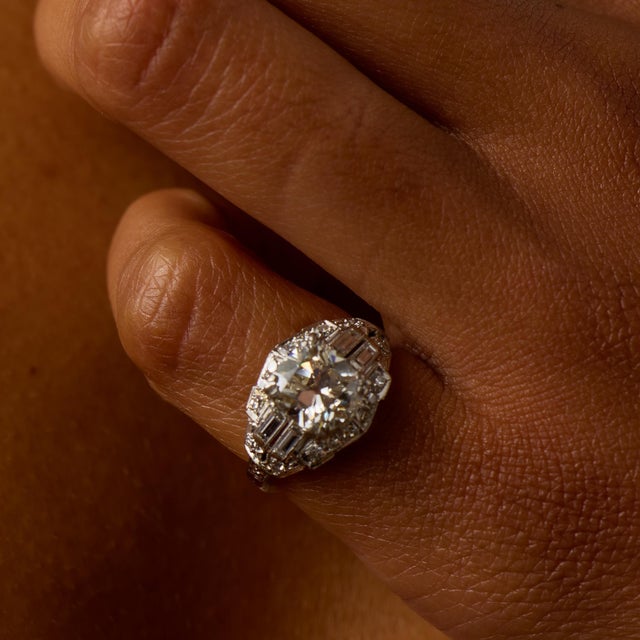 This elegant Art Deco engagement ring centers on a striking 2.02 carat old mine cut diamond, certified by GIA #2534480091,...