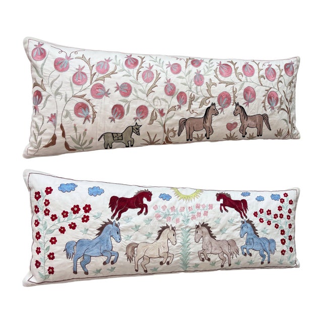 This beautiful 18'' x 54'' hand-embroidered Suzani pillow cover set was made from authentic Uzbek cotton fabric. The...