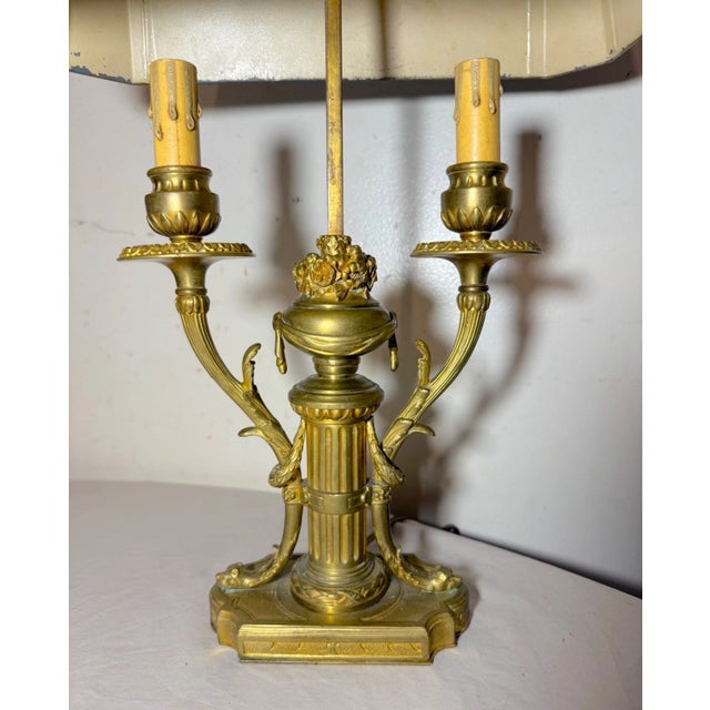 This antique ornate dore bronze French bouilotte electric table lamp features elaborate detailing and is very high...