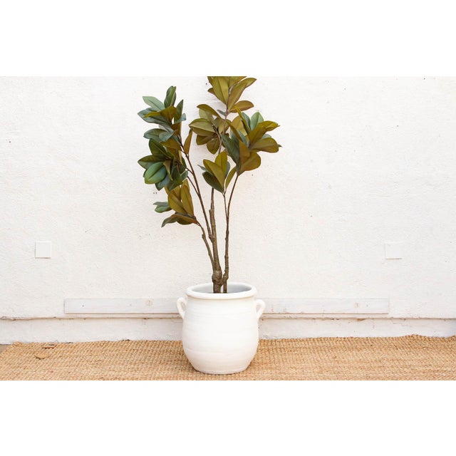Grounded, functional, and full of coastal character, This Mykonos clay pot is a versatile mid-sized planter inspired by...