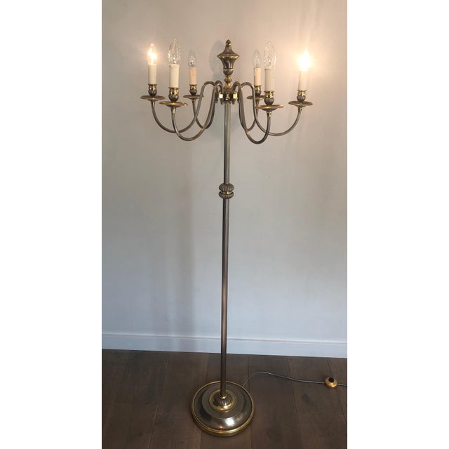 This beautiful 6-light neoclassical-style floor lamp is made of brass and silver. It is a French work. Circa 1940