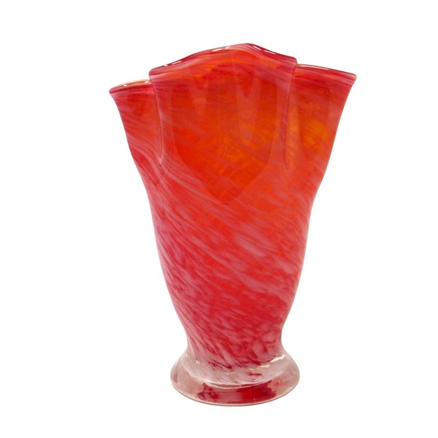 A vintage hand-blown orange and white glass handkerchief vase. The vase stands only 5 1/2 inches tall, and weighs about 1...