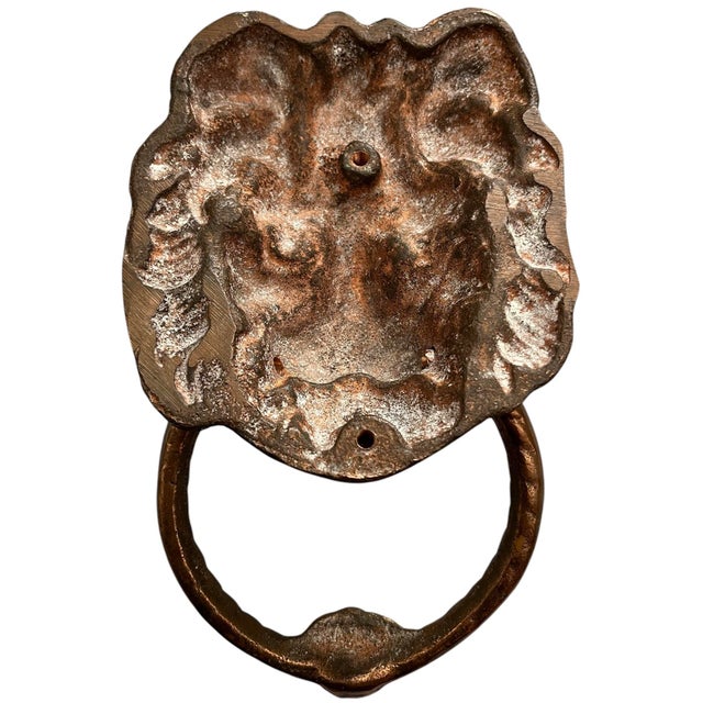 A classic lion's head door knocker on an entrance door always makes for a grand and sophisticated impression. This...