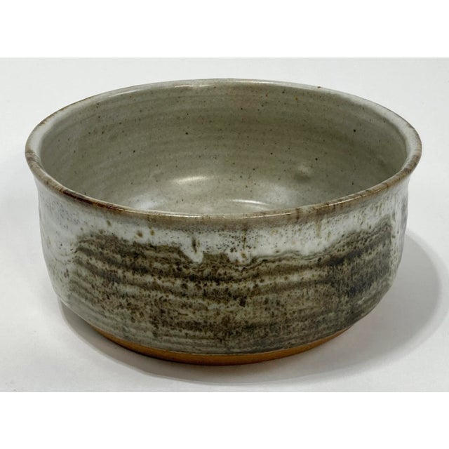 Vintage handmade matcha bowl featuring drip glazed rich browns and grays over speckled gray base. Signed by artist. Age...