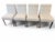 Sleek Contemporary SophisticationBring pristine modern elegance to your dining space with this striking set of four...
