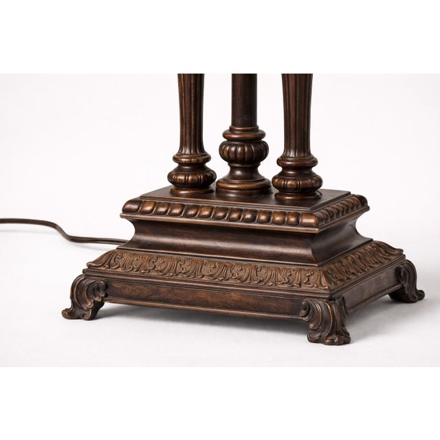 This elegant pair of table lamps dates to the mid-1980s and showcases a richly detailed Neoclassical–inspired design,...