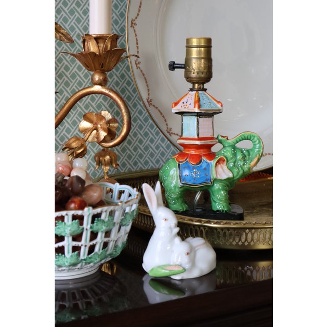 A rare and exceptionally well-preserved Japanese porcelain table lamp, circa 1930s–1950s, modeled as an auspicious...