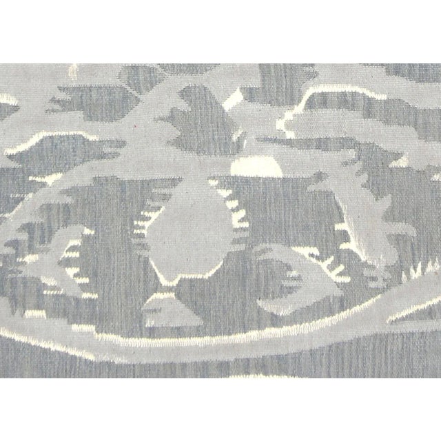 Contemporary Egyptian Kilim in Ikat Design. Hand woven in modern designs with wool on cotton foundation in the Fustat...