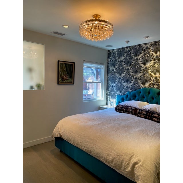 A striking Trillion flush-mount chandelier by Visual Comfort Studio, featuring a radiant arrangement of precision-cut...