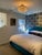 A striking Trillion flush-mount chandelier by Visual Comfort Studio, featuring a radiant arrangement of precision-cut...