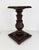 Antique carved wooden pedestal stand featuring an ornate floral and foliate design, a rich dark wood finish, and a square...