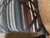 A beautiful pair of decorative throw pillows featuring a richly textured woven fabric and an intricate abstract geometric...