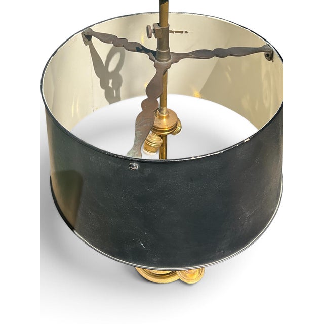 Antique-Style Brass Bouillotte Candlestick Lamp With Black Tole Shade A handsome French Neoclassical-inspired brass...