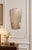 This free-form, engraved mirror from the 1960s captivates with its slender lines and organic silhouette, characteristic of...