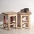 A pair of antique bedside tables in pine wood, with a square top and four tapered legs tied by box stretchers. They...