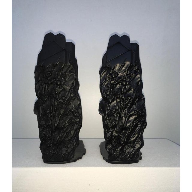 This intense abstract bronze sculpture, it is a multiple in limited edition not numbered. The title "Paesaggio con ombra",...