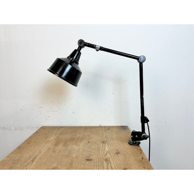 - Industrial workshop table lamp produced by Midgard in Germany during the 1930s. - Designed by Curt Fisher. - The lamp...
