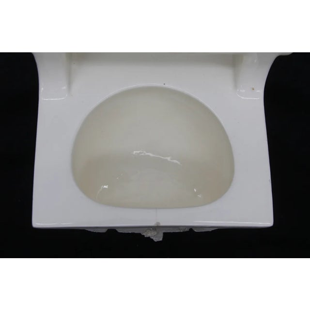 Porcelain over ceramic crackle glaze white recessed bathtub soap dish with handle. Good condition with surface wear and...