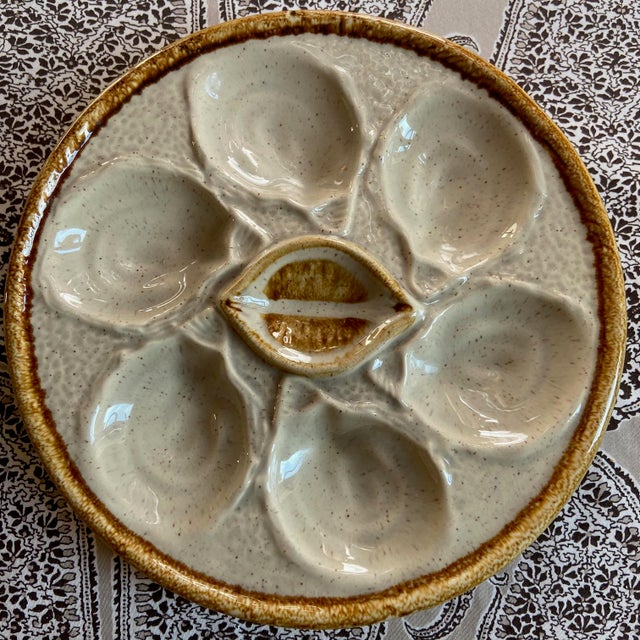 Oyster plates are a great classic of French majolica. This heavy sturdy thick potted plates are decorated with 6 oyster...