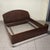 The "Model LT 37" double bed, an icon of mid-century Italian design, designed by architects Franco Albini and Franca Helg...