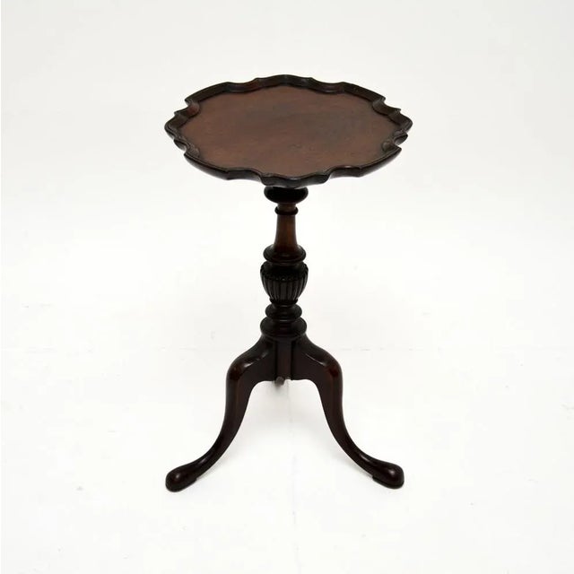 A charming and very well made antique wine table. This was made in England, it dates from around the 1900-1920 period. It...