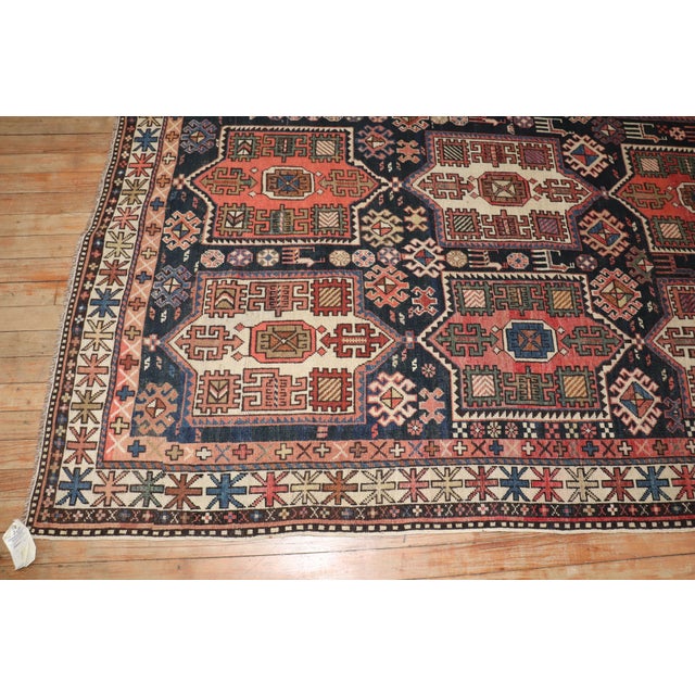 A large intermediate size Caucasian rug from the early 20th century Measures: 5'2'' x 9'4''. Antique Caucasian rugs from...