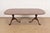 A gorgeous Georgian, Regency, or Queen Anne style double pedestal extension dining table By John Stuart USA, Circa 1970s...