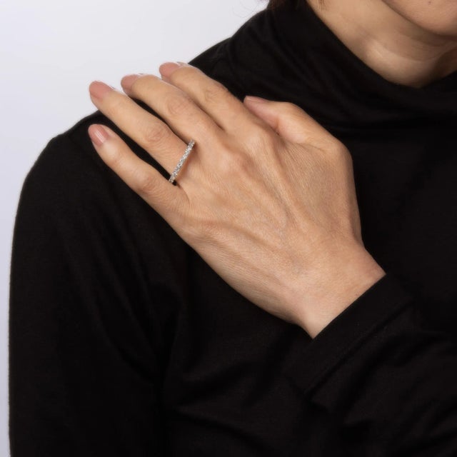 This is part of Chairish’s Fine Jewelry assortment. Stylish vintage diamond eternity ring crafted in 14 karat white gold....