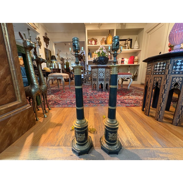 Pair Of French Neoclassical Style Lamps. We offer a great pair of French Neoclassical style tole and bronze table lamps....